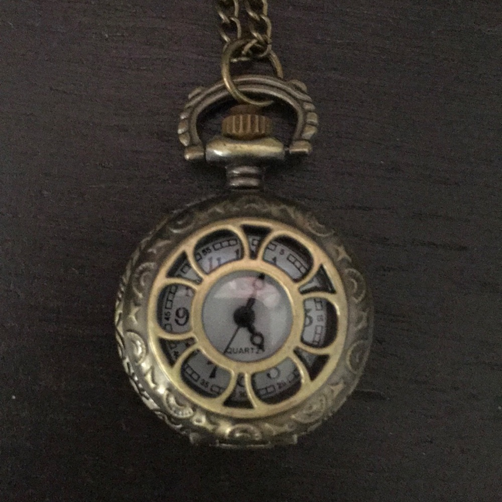 Pocket watch style long necklace.
